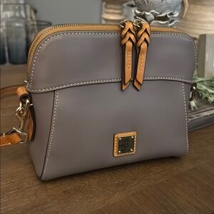 Dooney & Bourke Tan Crossbody Bag with Structured Shape and Gold-Toned Hardware